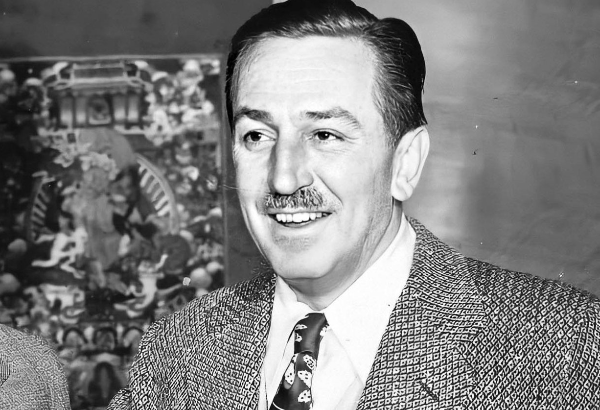 Grayscale Portrait Photo of American animator and film producer Walt Disney.