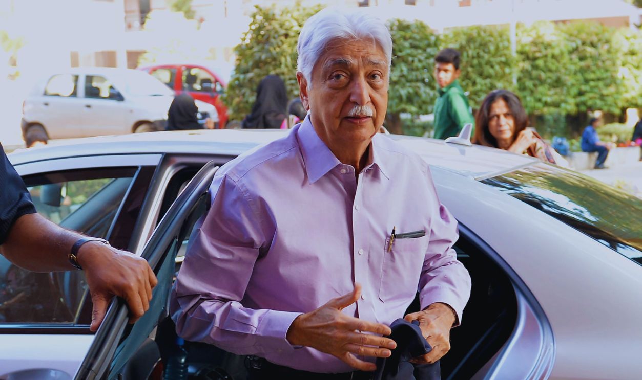 Gettyimages - 1148321352, INDIA-ECONOMY-SOFTWARE-IT-WIPRO In this photo taken on February 07, 2015, Indian chairman of Wipro Limited, Azim H. Premji (C) arrives for presentation of the annual