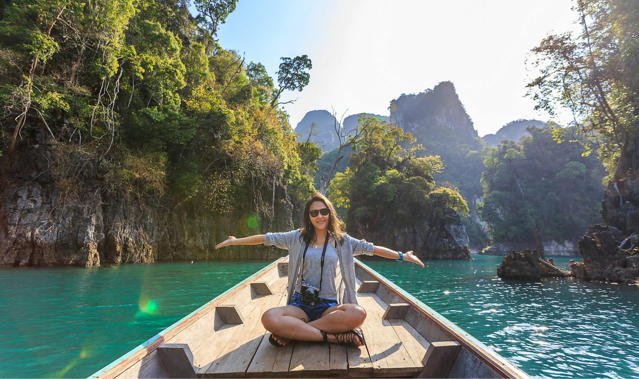 Photo of woman sitting on boat .