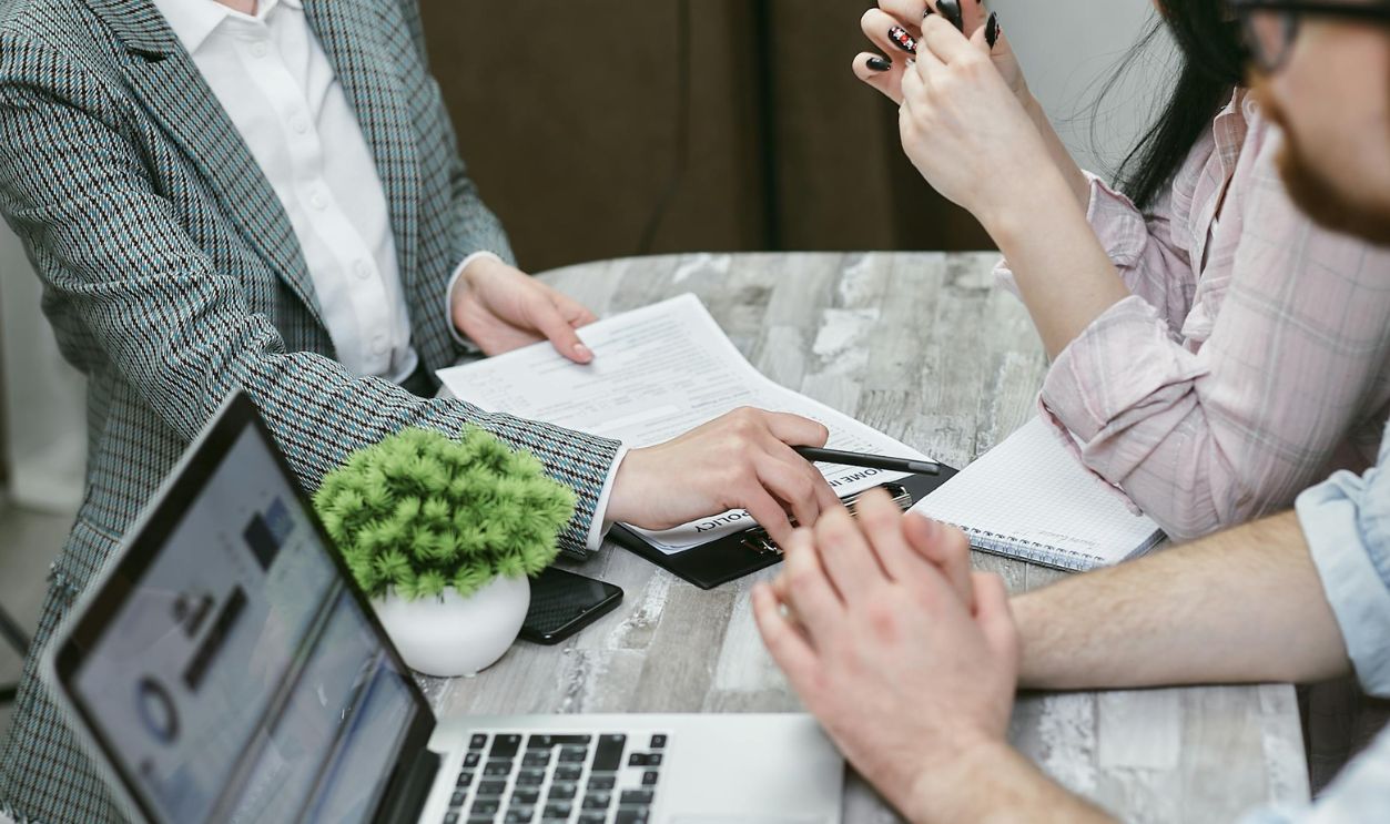 A Woman Holding a Contract