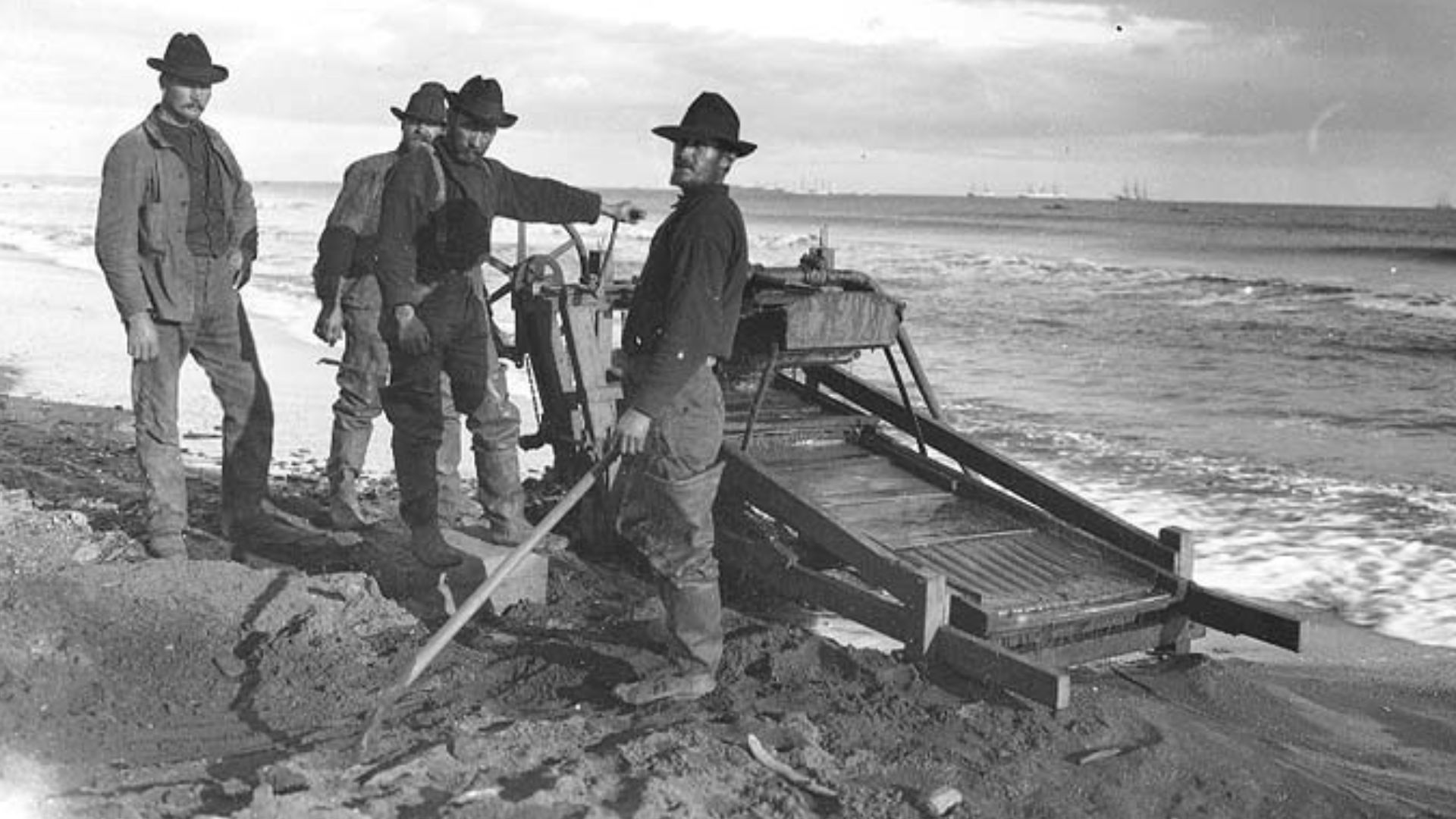 File:Four men using rocker to mine for gold on Nome beach, Alaska, ca 1900 (HEGG 542).jpeg