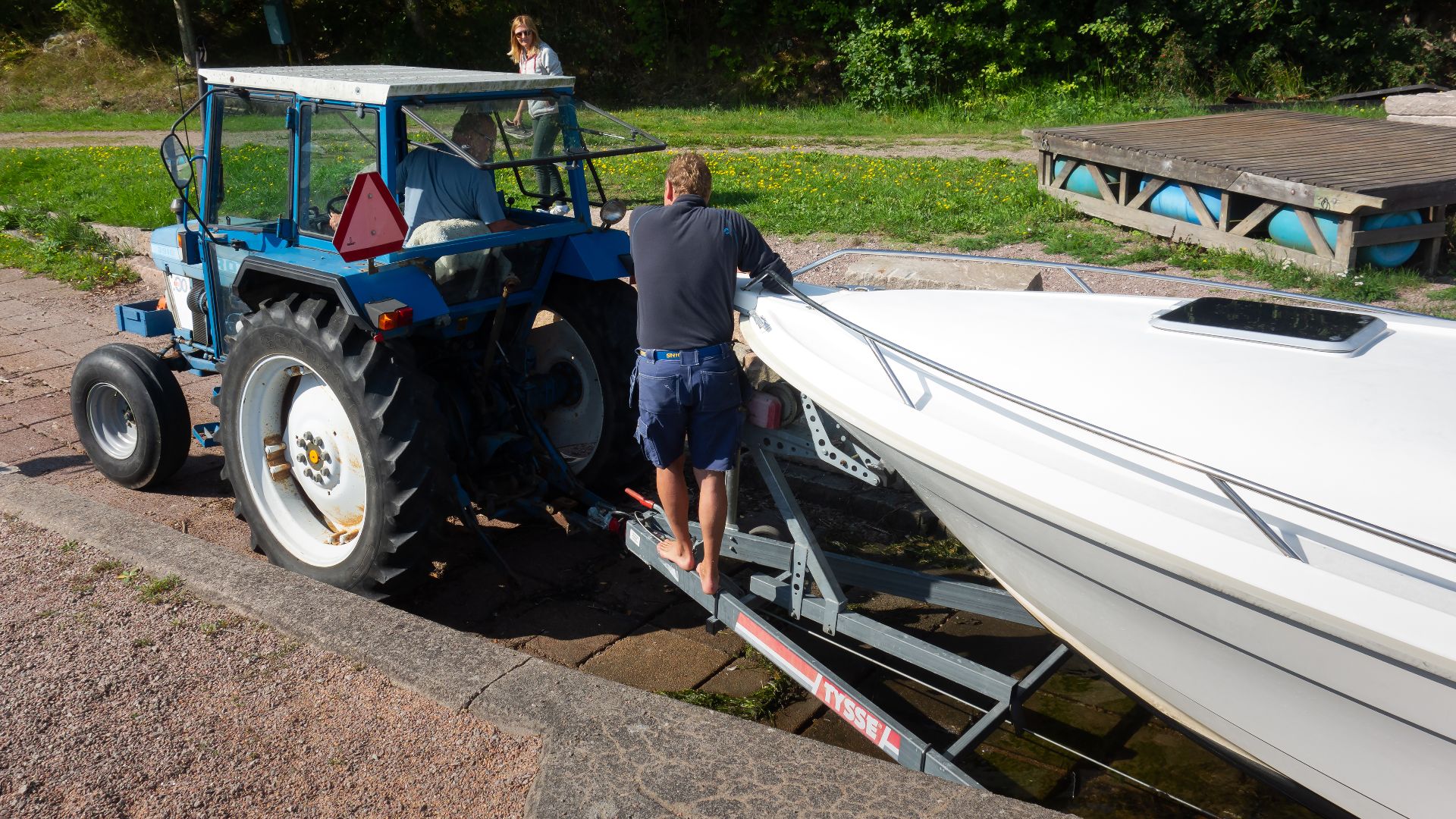 File:Getting the boat out of the water 5 - Hauling the trailer with the boat up from the boat ramp 2.jpg