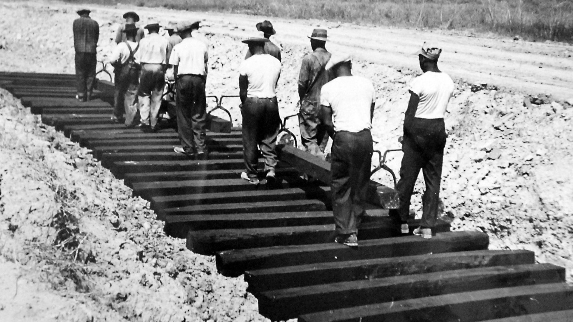 File:African-American workers laying railroad ties for spur line, 1942 (27255092036).jpg