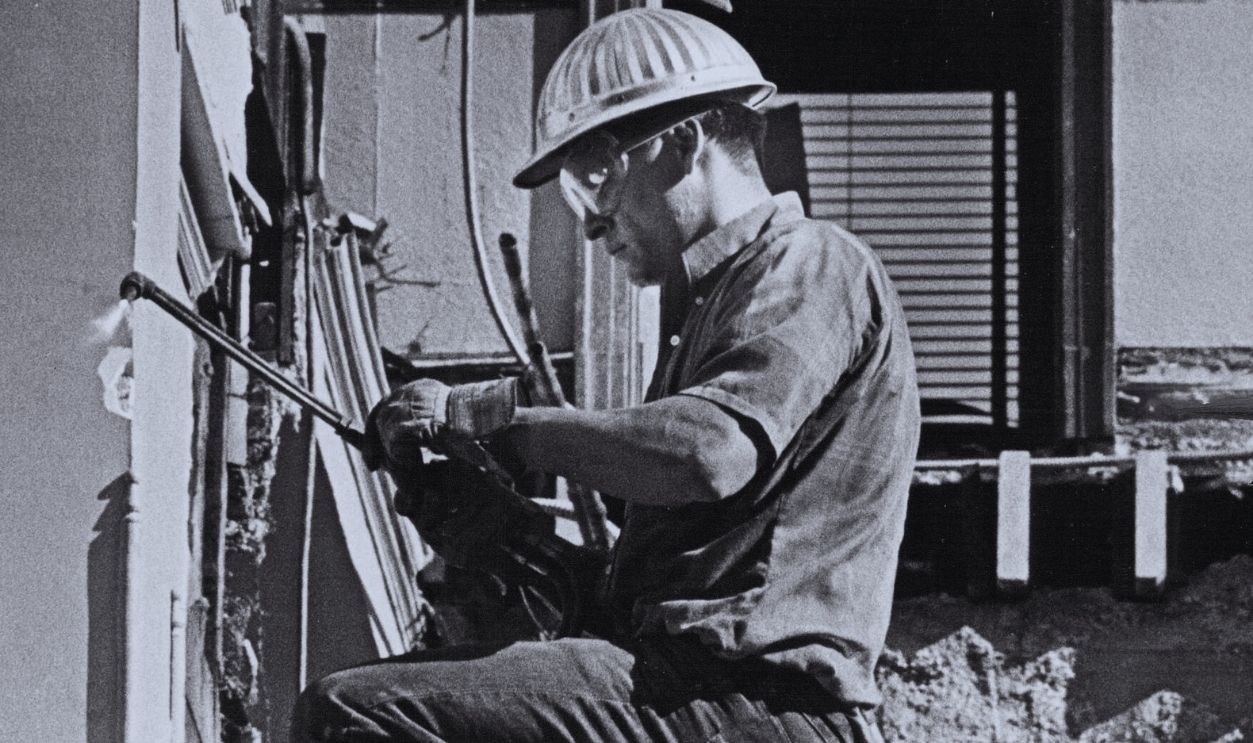 Gettyimages - 162079505, OCT 31 1968, NOV 7 1968; Robert Maestas, a Barnett Co. employe, cuts a steel support beam from Hewit OCT 31 1968, NOV 7 1968; Robert Maestas, a Barnett Co. employe, cuts a steel support beam from Hewitt Building wall, 728 15th St., as wrecking enters final stages.;