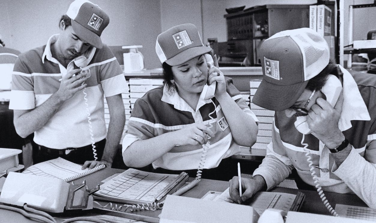 Gettyimages - 	162066746, 1-26-87; Domino's employees man the phones during the first half of the Super Bowl..; 1-26-87; Domino's employees man the phones during the first half of the Super Bowl..;