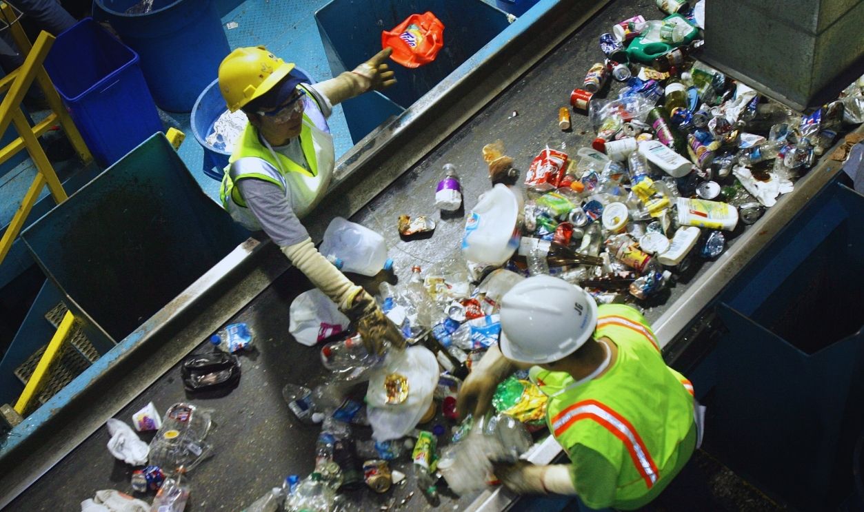 Gettyimages - 	1258310086, US-ENVIRONMENT-RECYCLING Workers sort colored plastics 09 May 2007 at the Montgomery County Recycling Center in Rockville, Maryland. The 57 000 square-foot (5295 square-meter) facility cost approximately nine million USD to construct and opened in 1991.