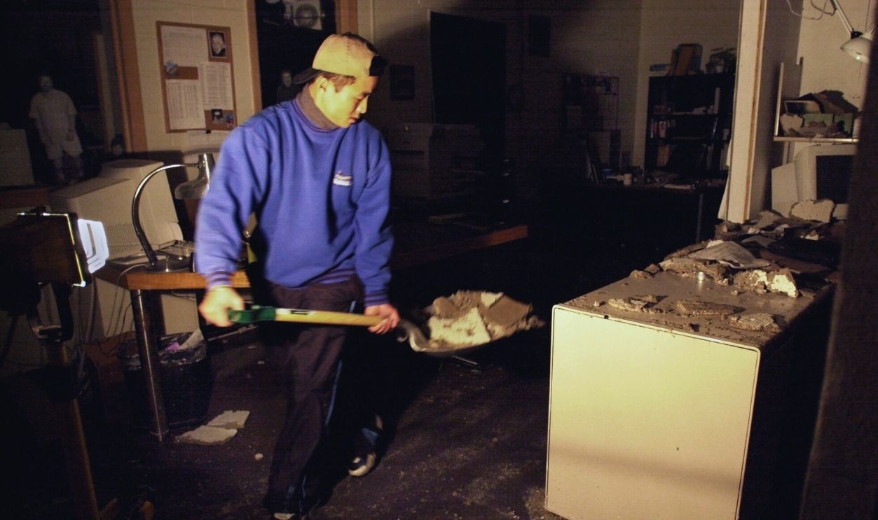 Gettyimages - 1154188656, GENERAL INFORMATION: Two water main breaks at the Guthrie Theater caused extensive damage. IN THIS PHOTO: Minneapolis, Mn., Thurs., Jan. 3, 2002--Matt Johnson, an employee of Pro 1 Restoration, shovels out the production, design, stage management and spe