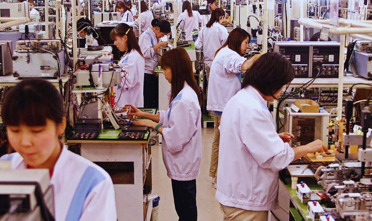Gettyimages - 2670654, (FILES) Photo taken 06 December 2001 sho TOKYO, JAPAN: (FILES) Photo taken 06 December 2001 shows employees of Japan's electronics giant Sony's Sakado plant working at its MD assembly line in suburban Tokyo. Sony announced 28 October 2003 it would cut 20,000 jobs over three years as part of a package of new business measures aimed at reviving its profit structure, with 7,000 employees to go in Japan.