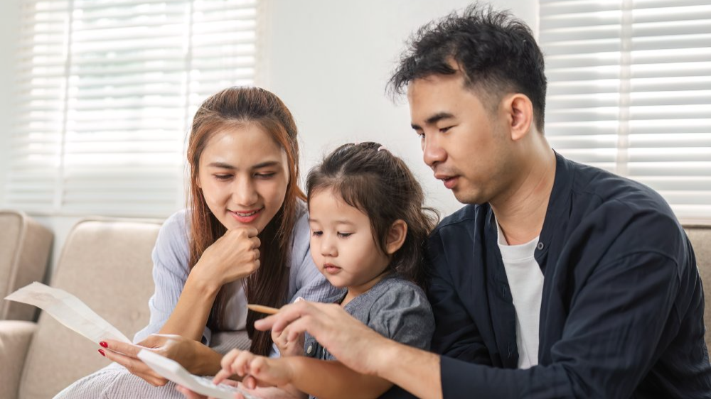 Family budgeting session with a focus on savings and financial education