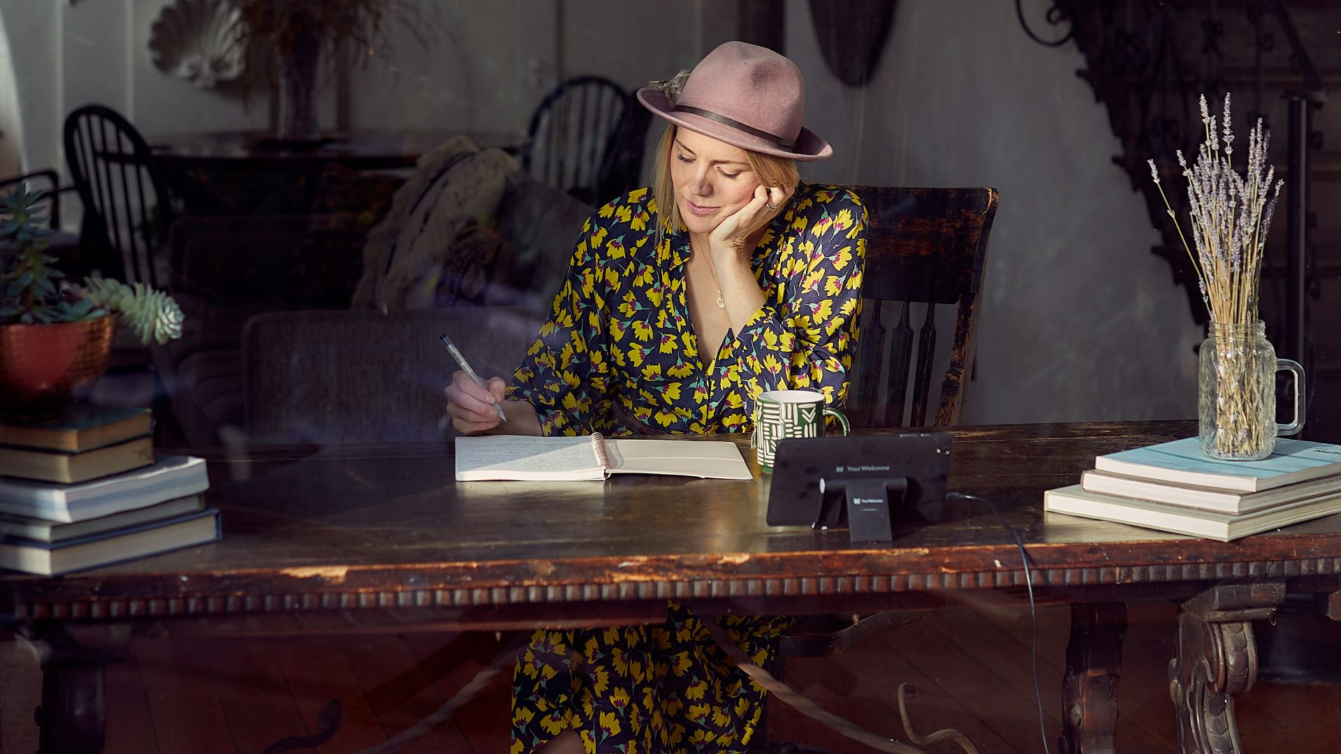 woman in black and white hijab sitting on chair