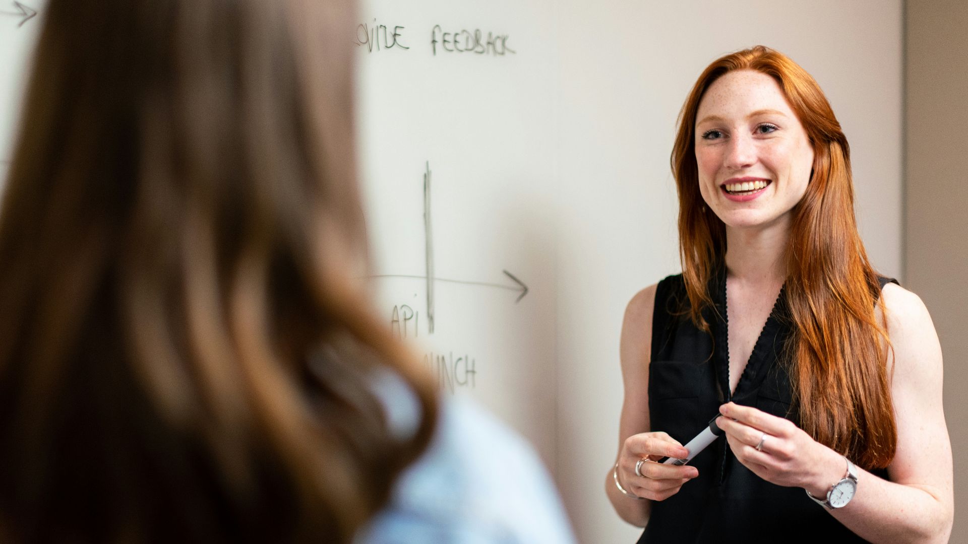 woman in black sleeveless top