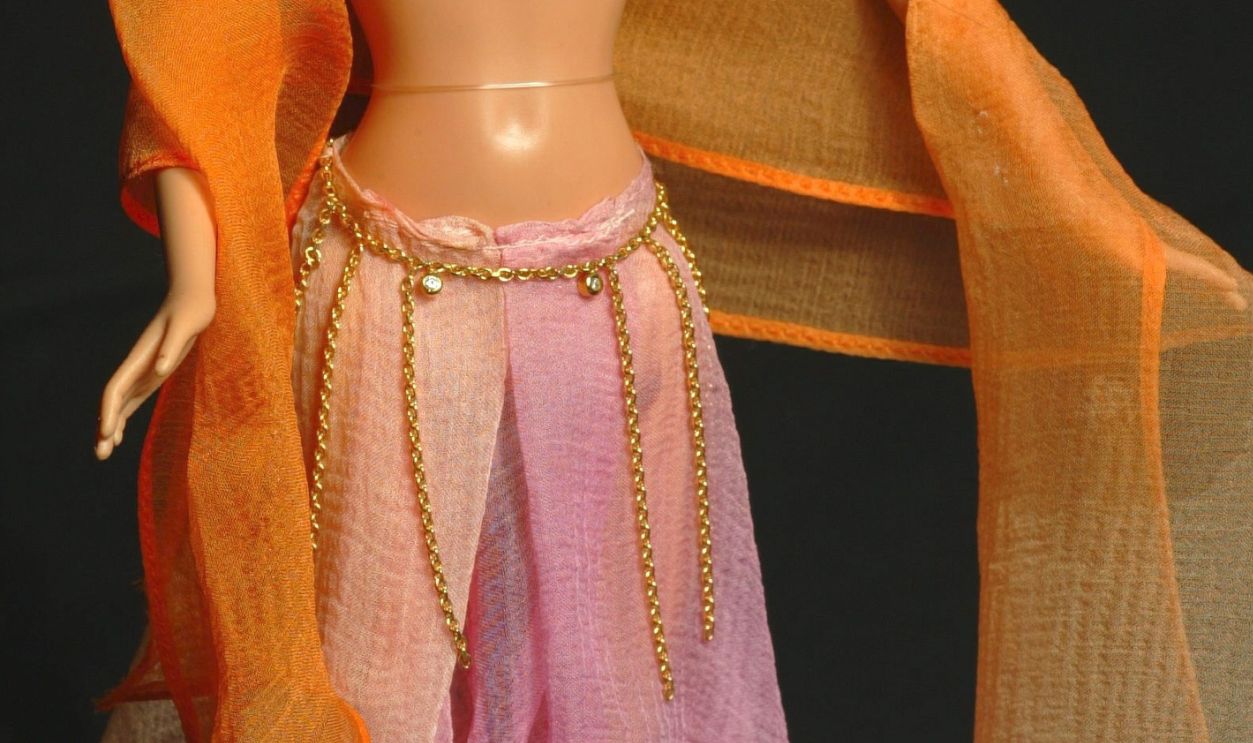 Barbie Jewelry 2003 Collection To Be Sold By Auction To Benefit The French Red-Cross. On December 11, 2003 In Paris, France. De Beers Barbie. Clothes By Fatima Lopez And Jewels By Ezzideen Jewelry. The Bikini Top And Belt Are Studded With Diamons. The Skirt And Froufrou Peignoir Are Hand Painted, Nuances Mousseline Silk. Hair And Make Up By Nunzio Carbone For Odile Gilbert. 