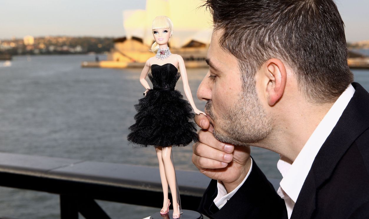 Jewellery designer Stefano Canturi poses with the world's most expensive Barbie doll at the Barbie Basics Collection Launch during Rosemount Australian Fashion Week Spring/Summer 2010/11 at the Overseas Passenger Terminal at Circular Quay on May 4, 2010 in Sydney, Australia. RAFW is celebrating its 15th anniversary this year, with more than 100 designers showcasing their collections in 63 shows during the five day event.
