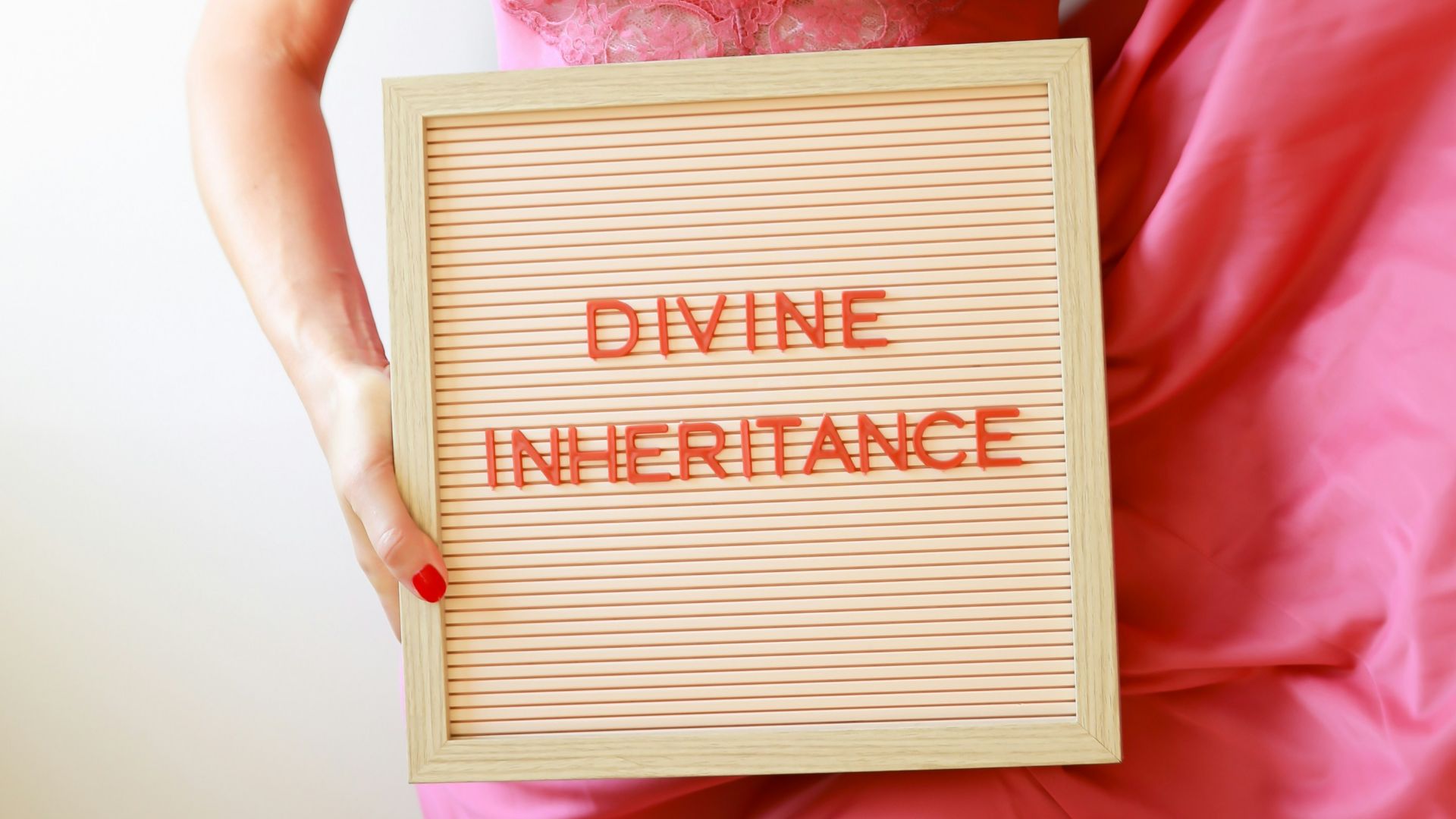 Woman holds a sign that says