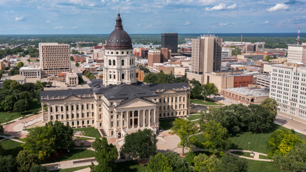 The image showcases a Vibrant urban scene of Topeka, Kansas
