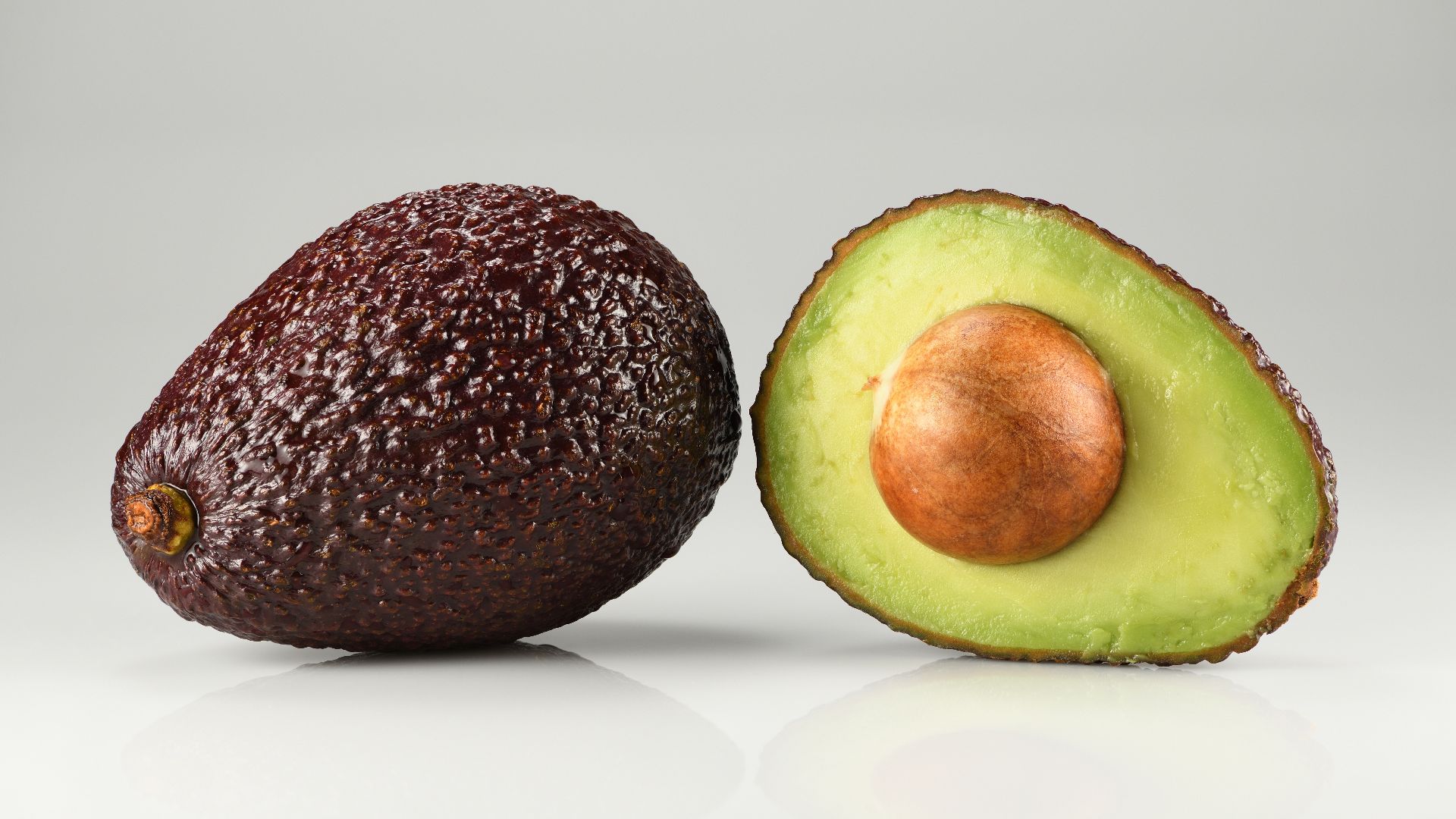 File:Avocado Hass - single and halved.jpg