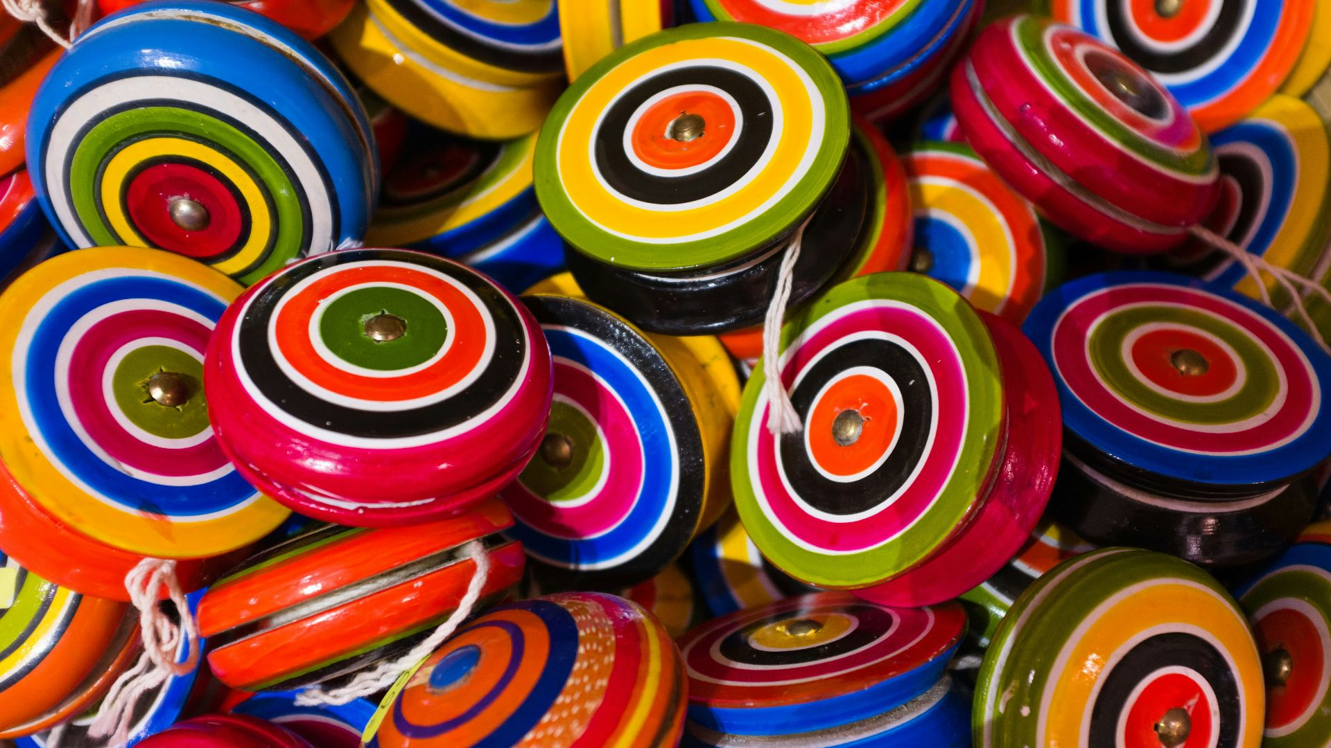 a pile of colorful buttons sitting next to each other