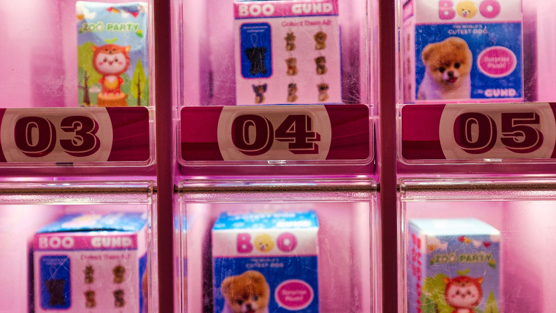 A display case filled with different types of toys