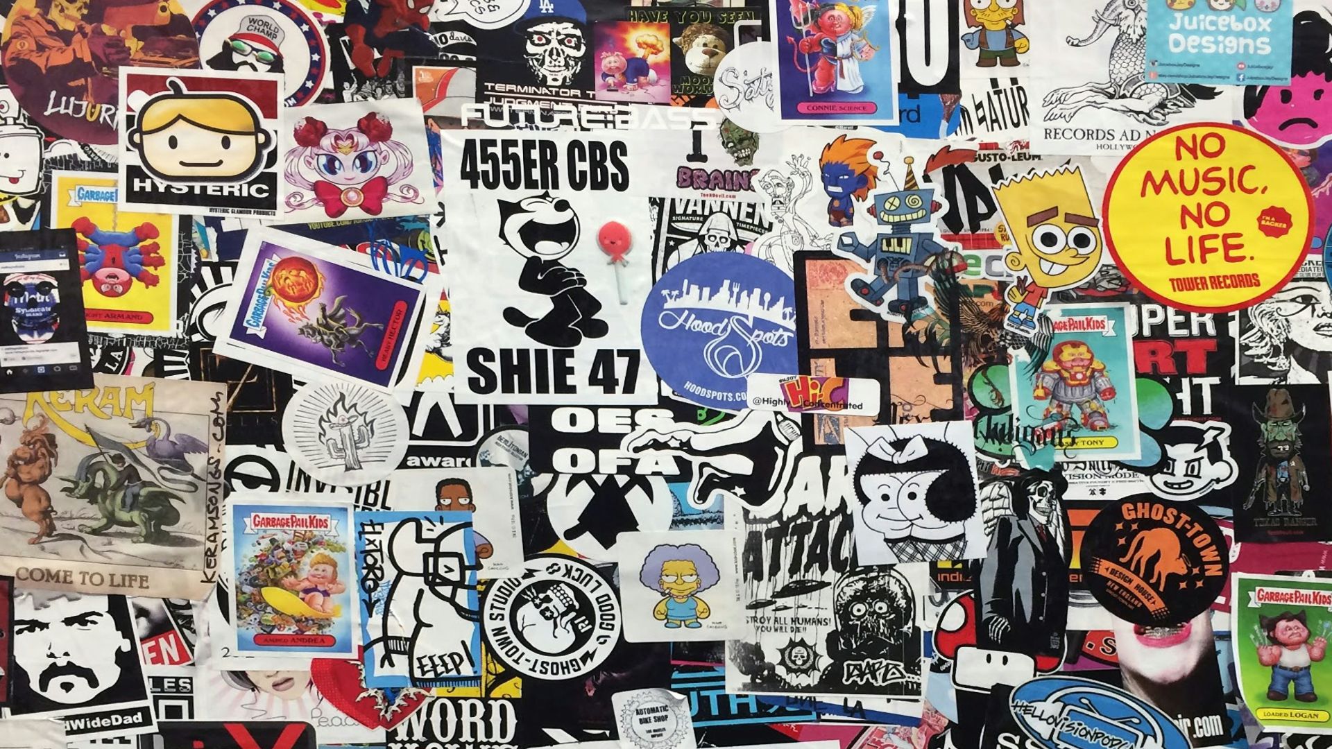 assorted stickers on white wall