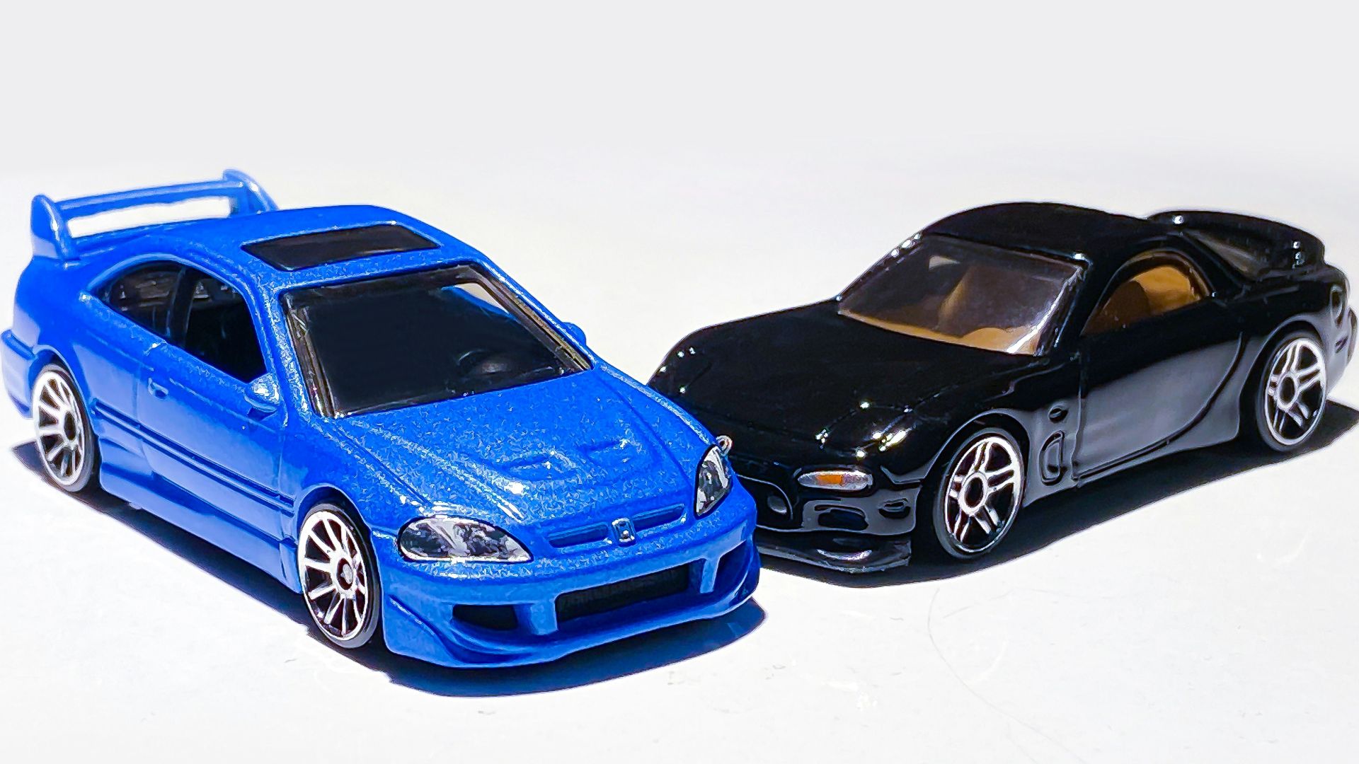 blue bmw coupe on snow covered ground