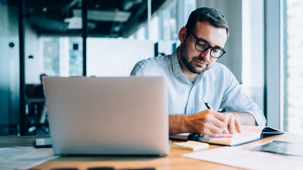 Professional expert working with information for business report