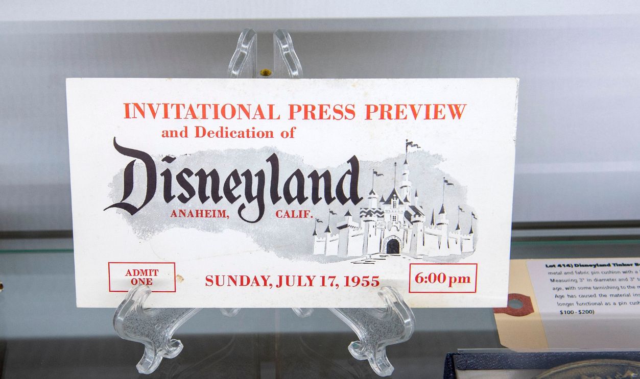 Walt Disney personally built belle train stove (L) and Disneyland opening day press preview ticket (R) are seen at the preview of the exhibition and auction 