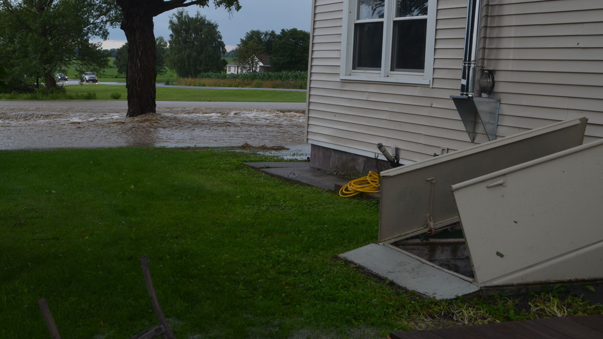 File:Flash flood Canandaigua NY July 23, 2017 cellar door, basement flooding.jpg
