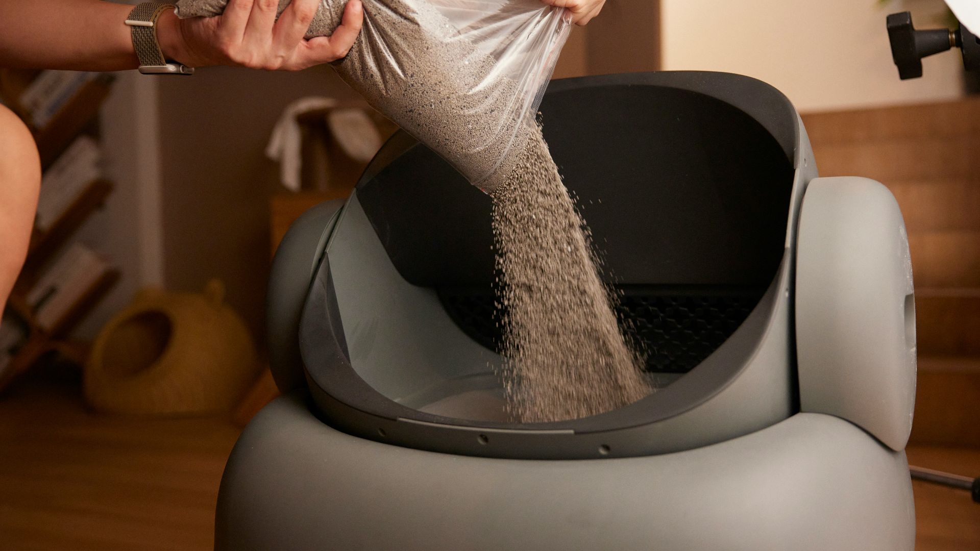 A woman in a silver dress is washing her feet