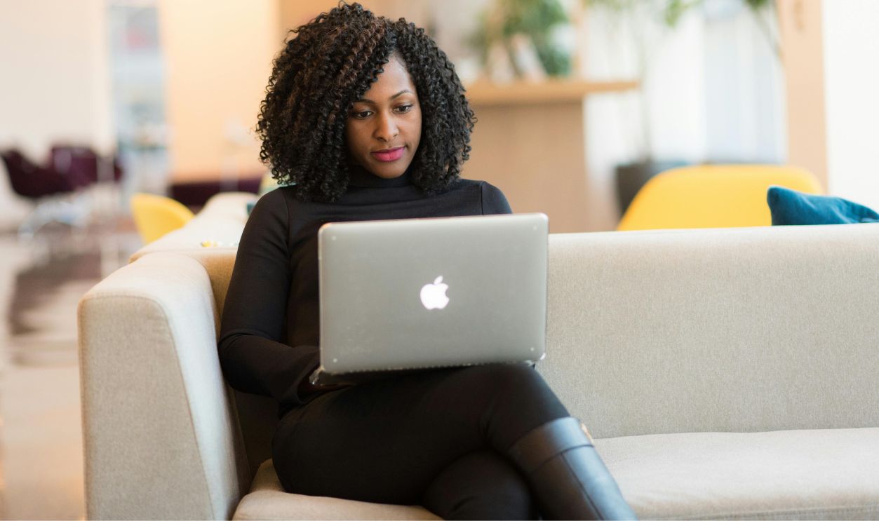 Woman sitting on couch