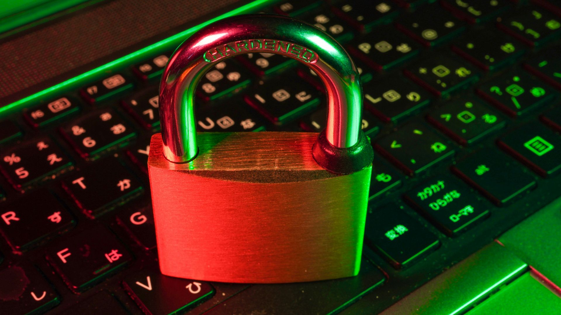red padlock on black computer keyboard