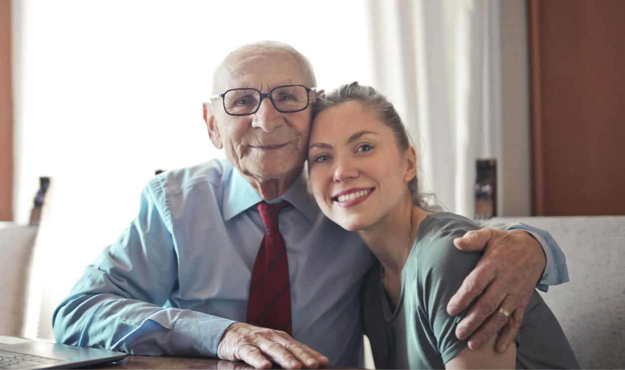 Positive senior man in formal wear and eyeglasses 