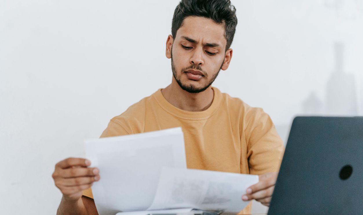 Man looking through documents