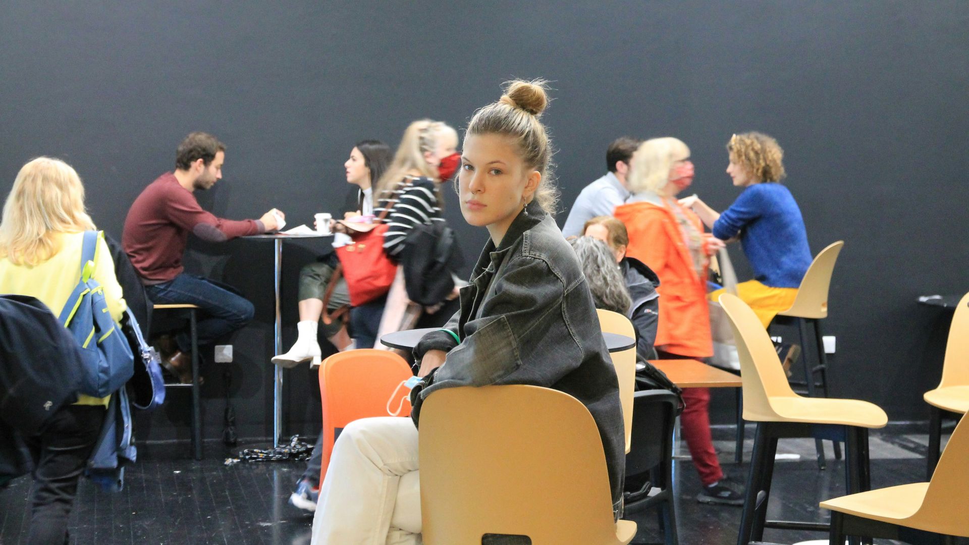 people sitting on chair inside room