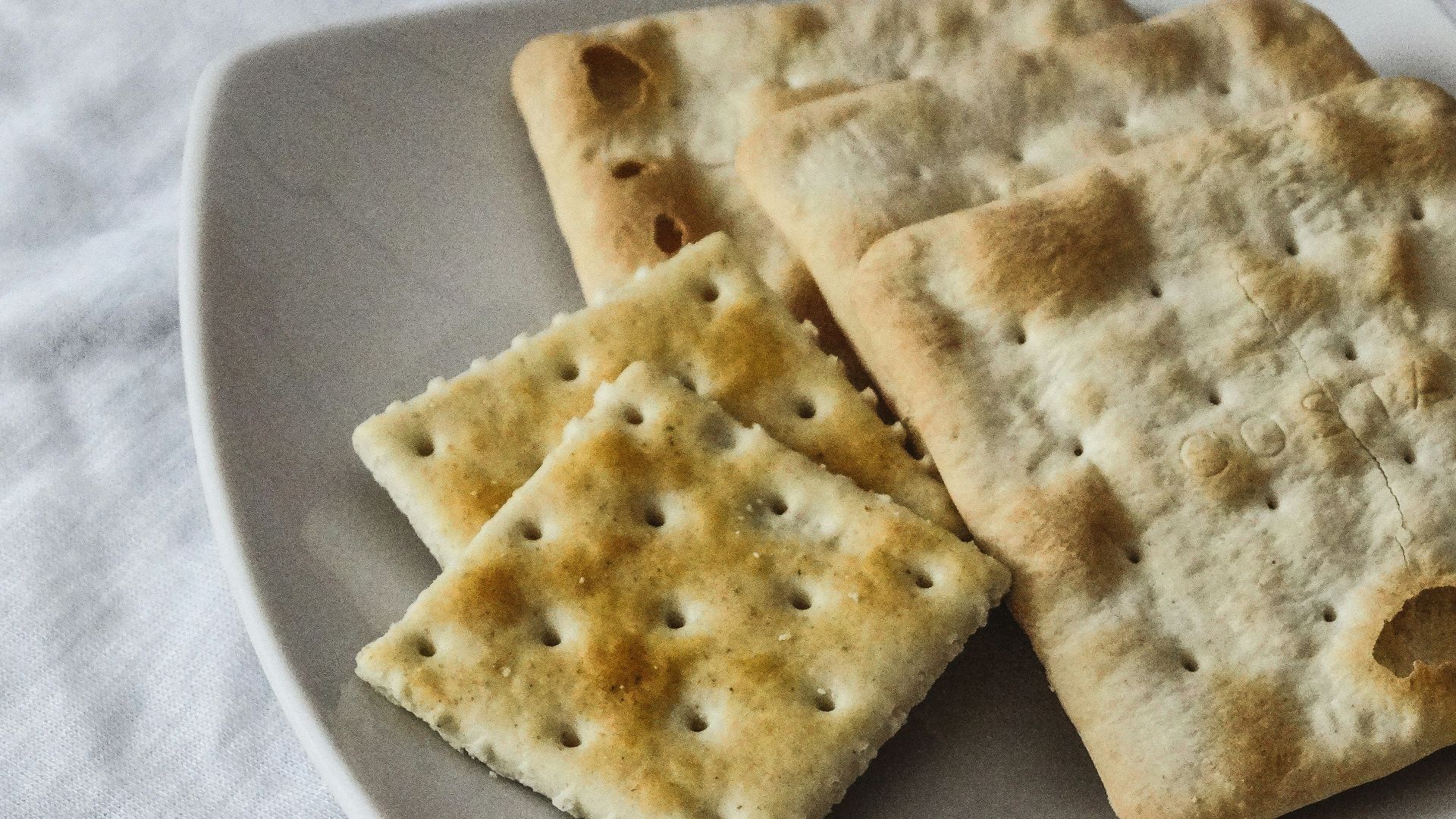 brown biscuits on white ceramic plate