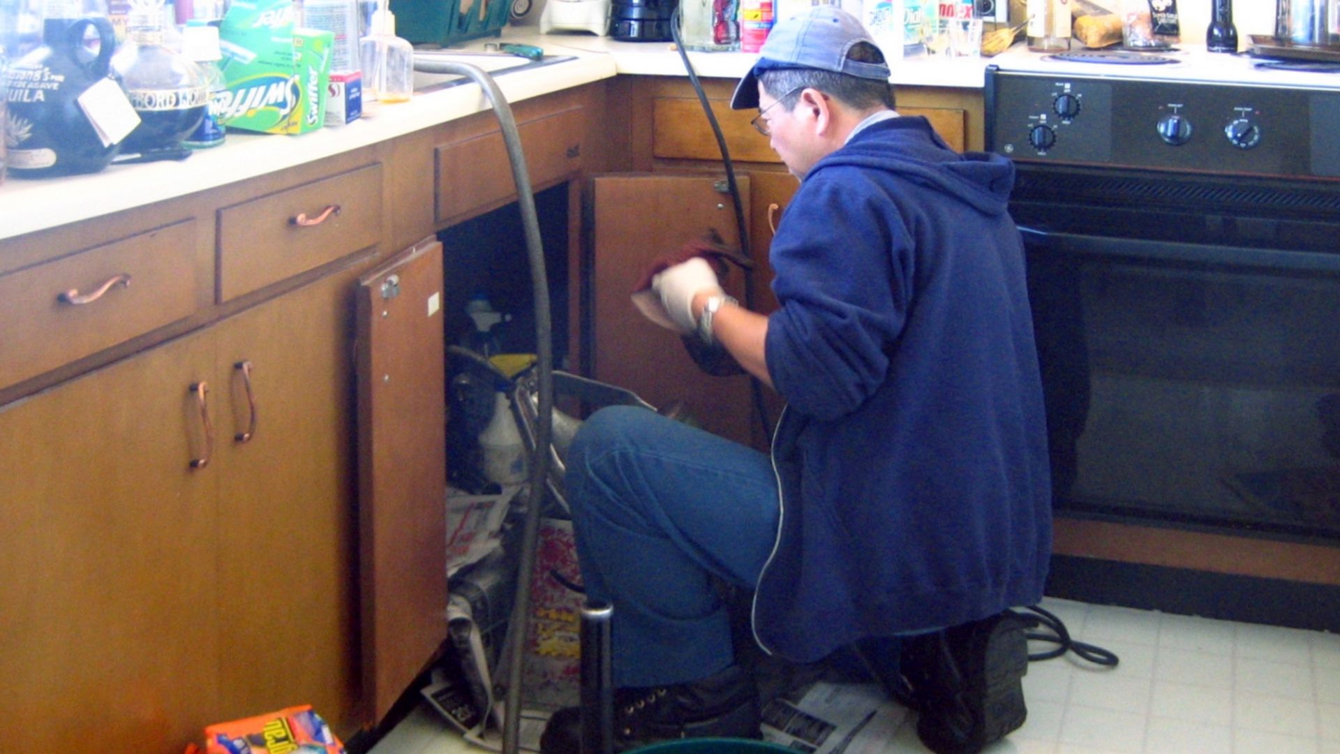 File:Plumber at work (retouched).jpg