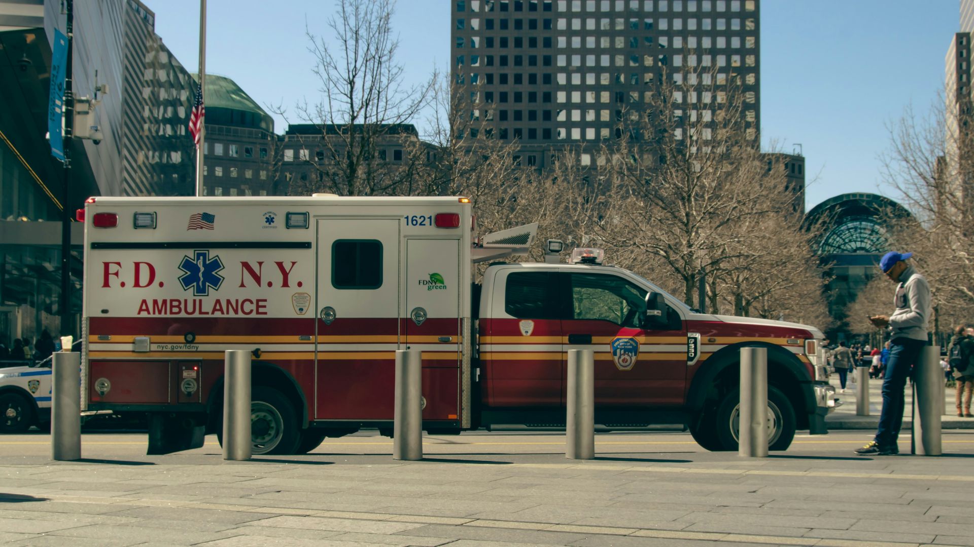 an ambulance is parked on the side of the road