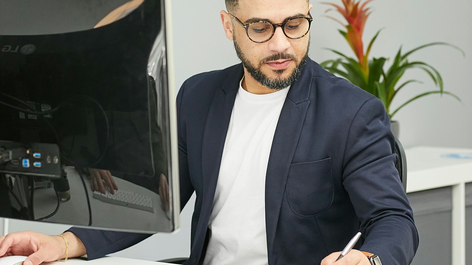 a man sitting at a desk