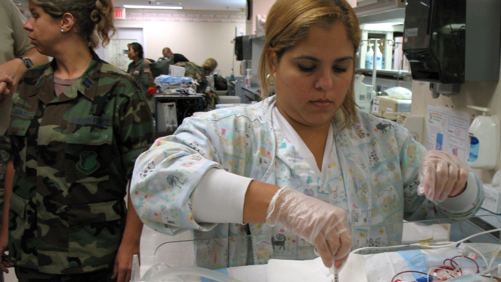 File:A Resperatory Therapist treating a newborn child Pulaski County Technical College Respiratory Therapist Program.jpg