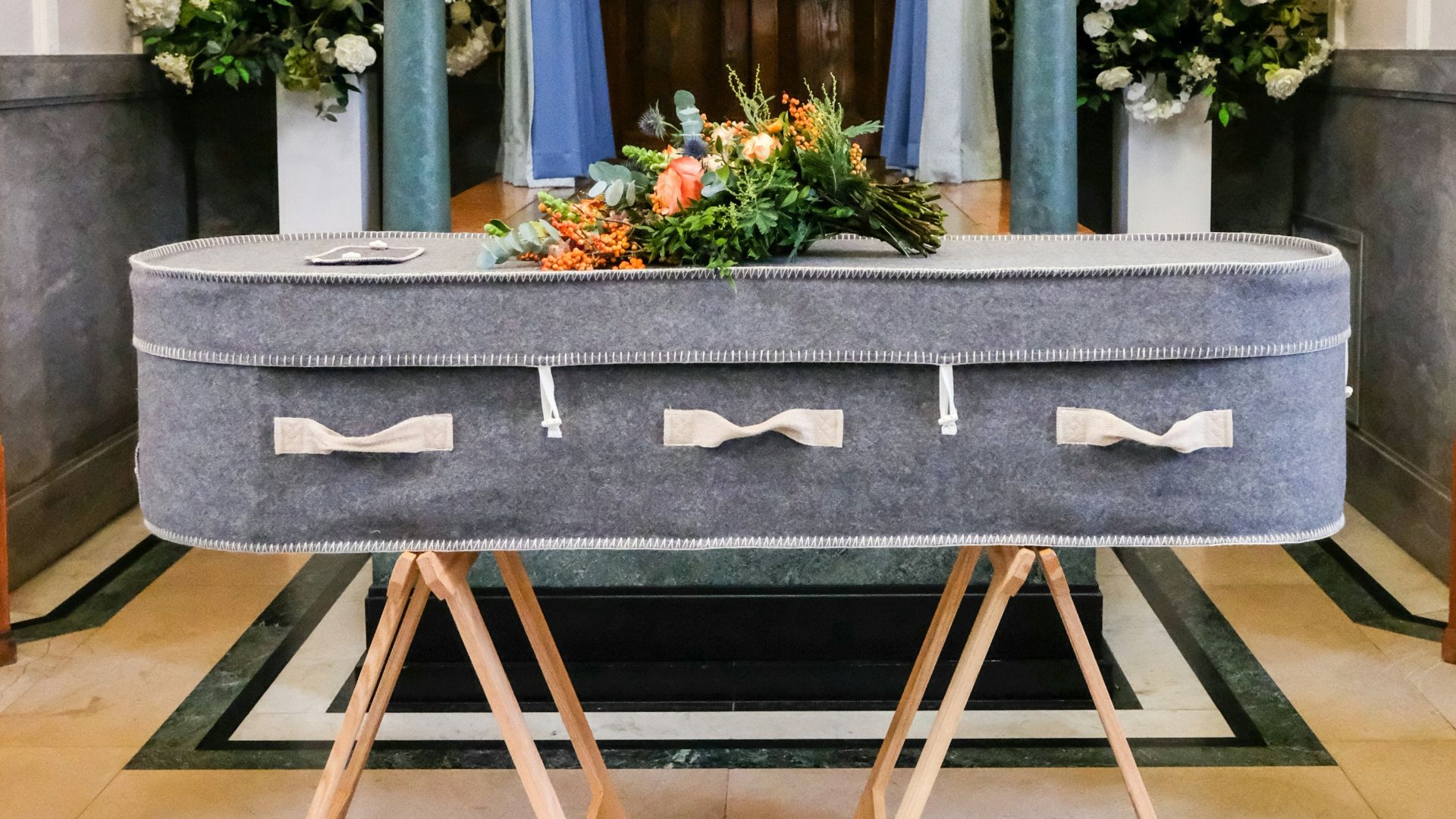 a very big nice looking church with a big table