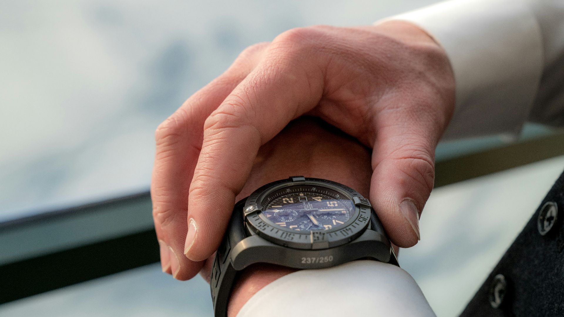 person looking at watch