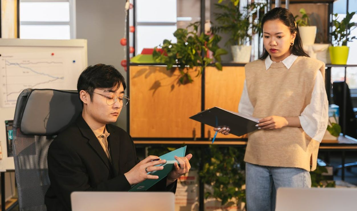 Employee talking to boss