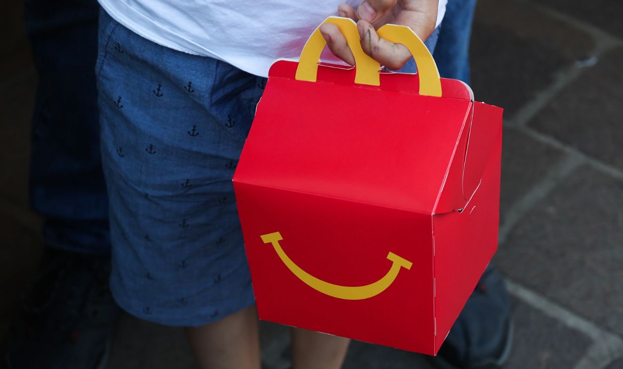 A child holds McDonald's Happy Meal box in Krakow, Poland on June 23, 2022.