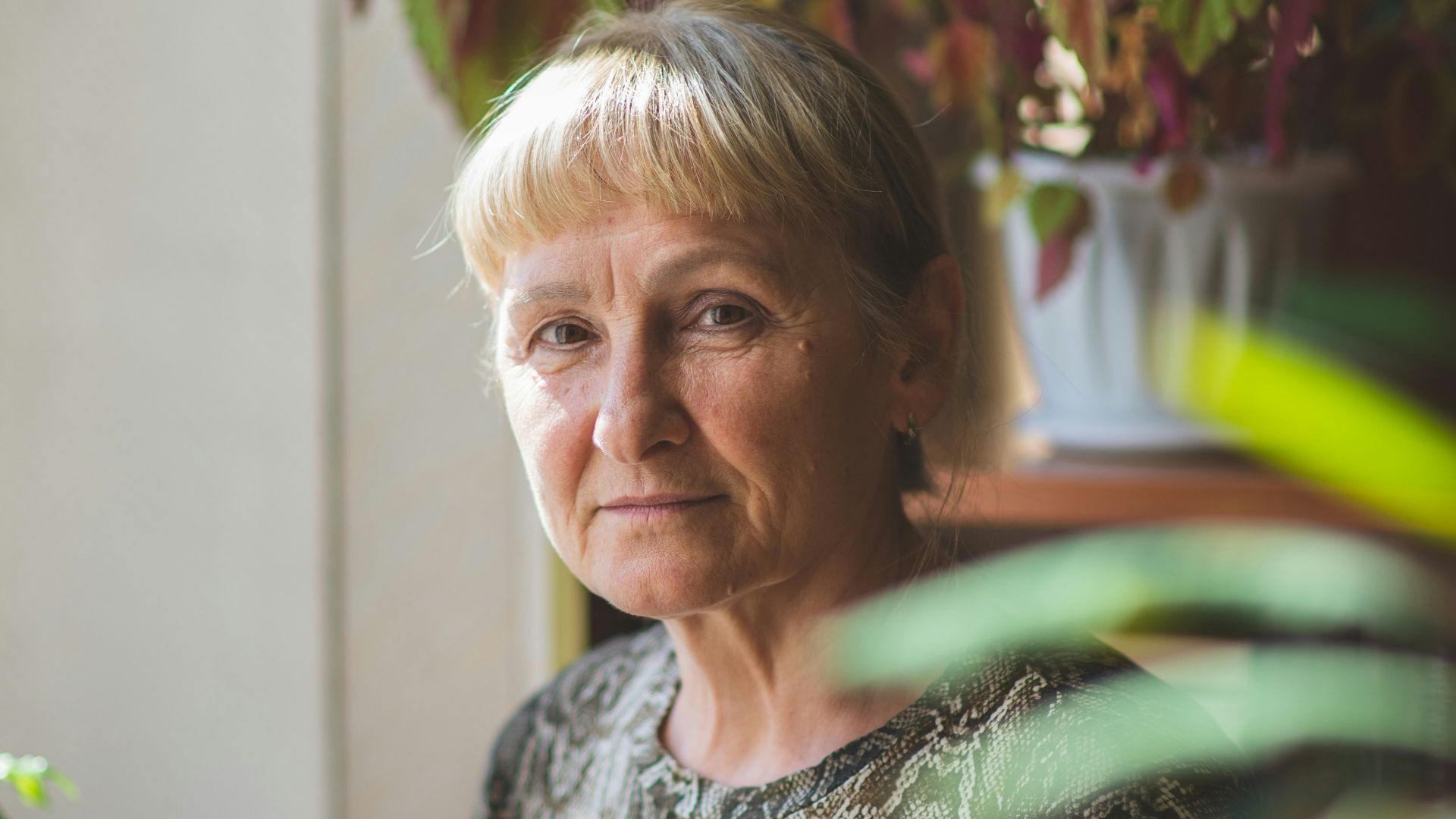 woman in gray and white crew neck shirt