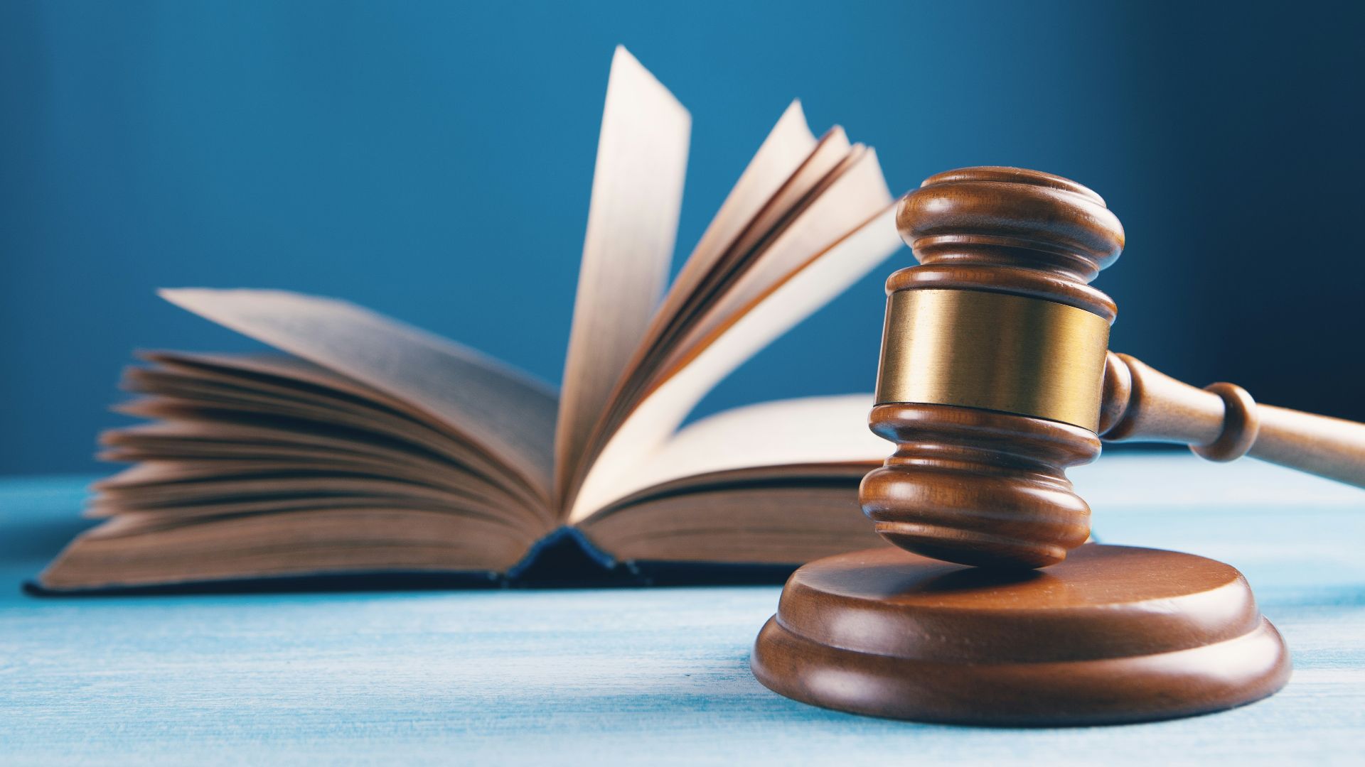 open book on brown wooden table