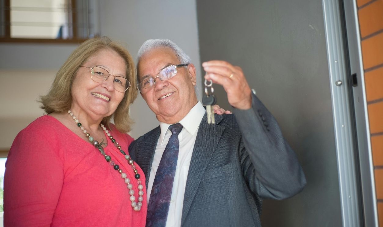 Elderly Man Holding House Keys