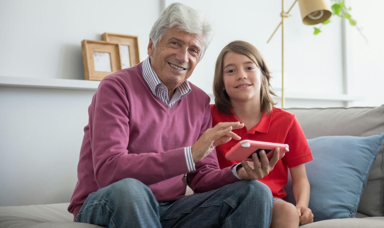 An Elderly Man with His Granddaugther 