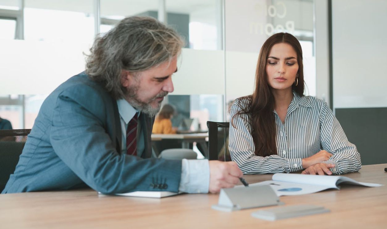 A Woman Speaking With A Lawyer
