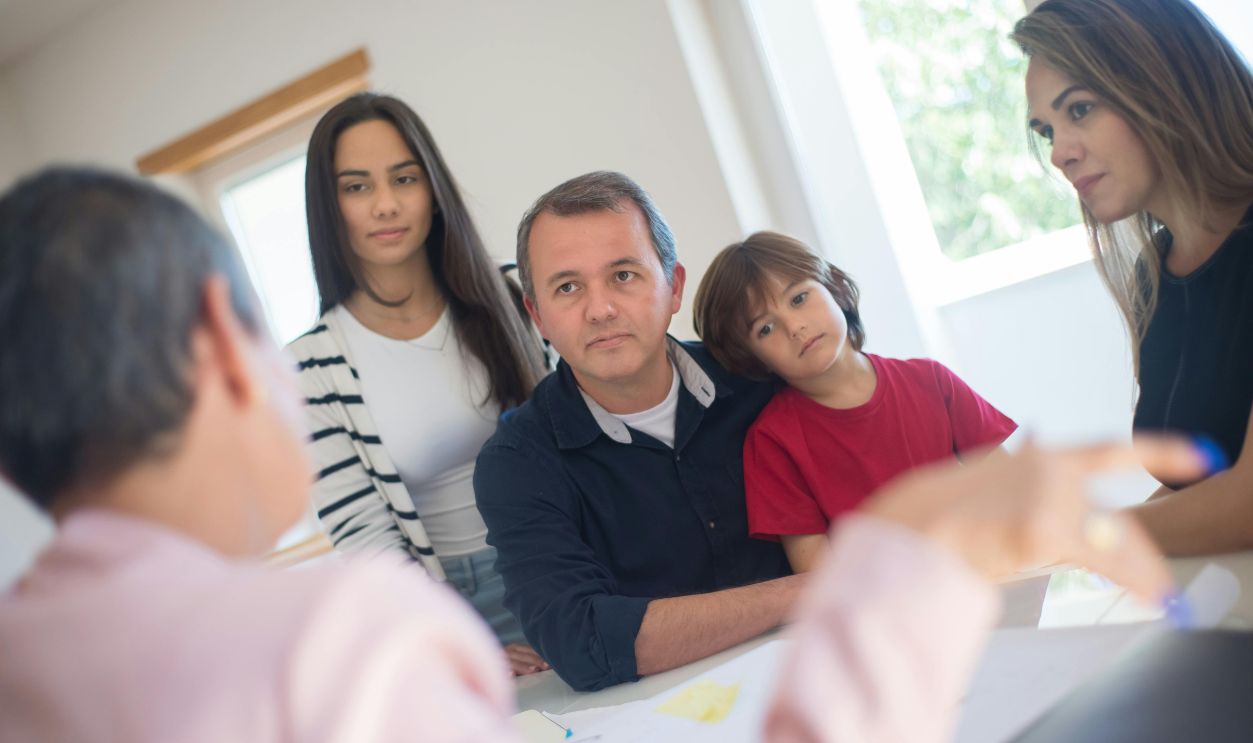 A Family Sitting at the Table