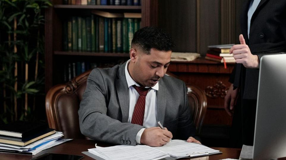 Lawyers in an Office Looking at Documents