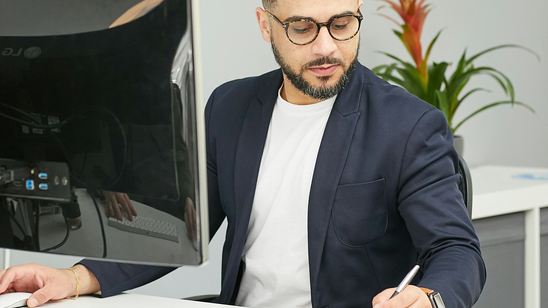 a man sitting at a desk